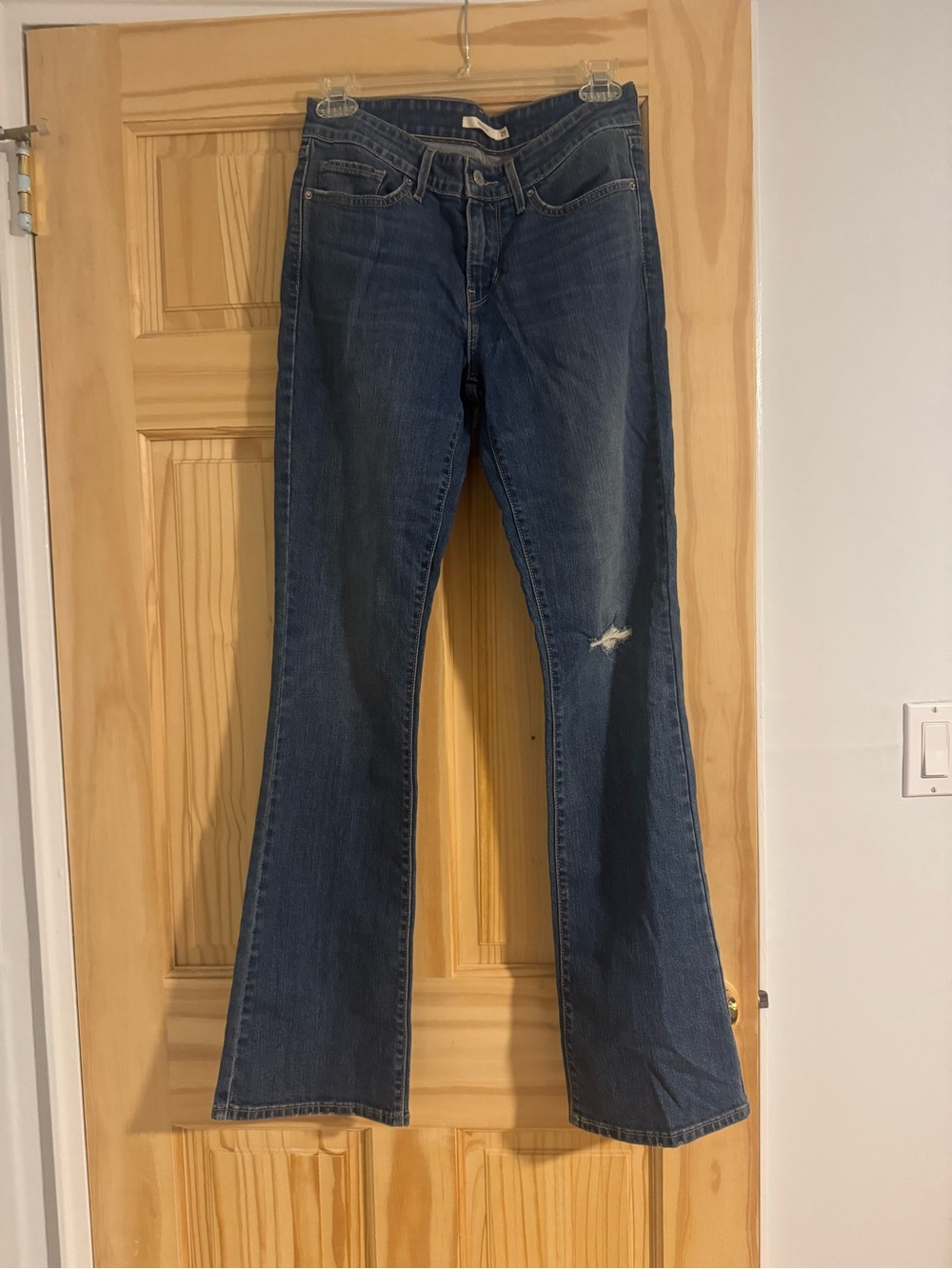 Levi's Medium Blue Bootcut Jeans with Knee Distress